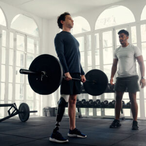 Man with prosthetic leg weight lifting